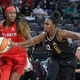 Rhyne Howard #10 of the Atlanta Dream drives against Chelsea Gray #12 of the Las Vegas Aces during their game at Michelob ULTRA Arena on August 09, 2022 in Las Vegas, Nevada. The Aces defeated the Dream 97-90. (Photo by Ethan Miller/Getty Images)